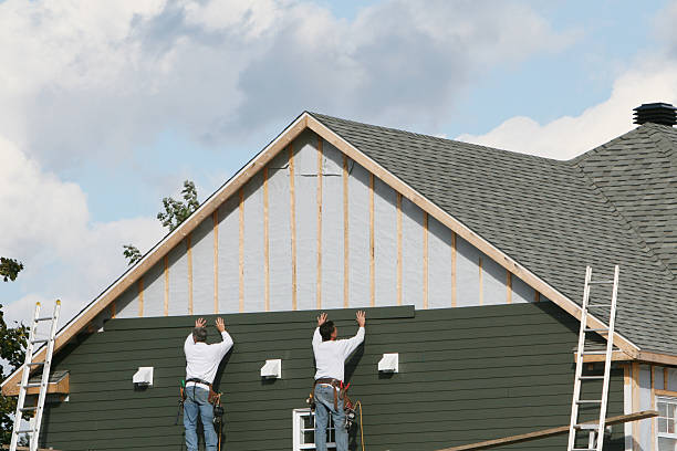 Professional Siding Repair technician working in Drake, CO